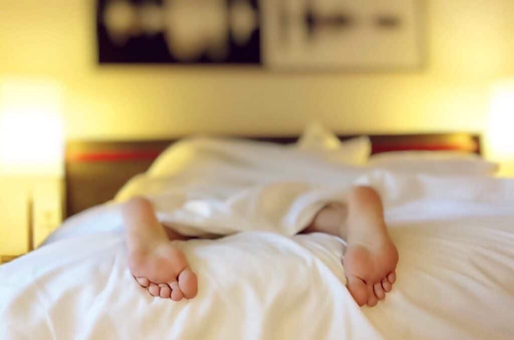 Feet in a bed