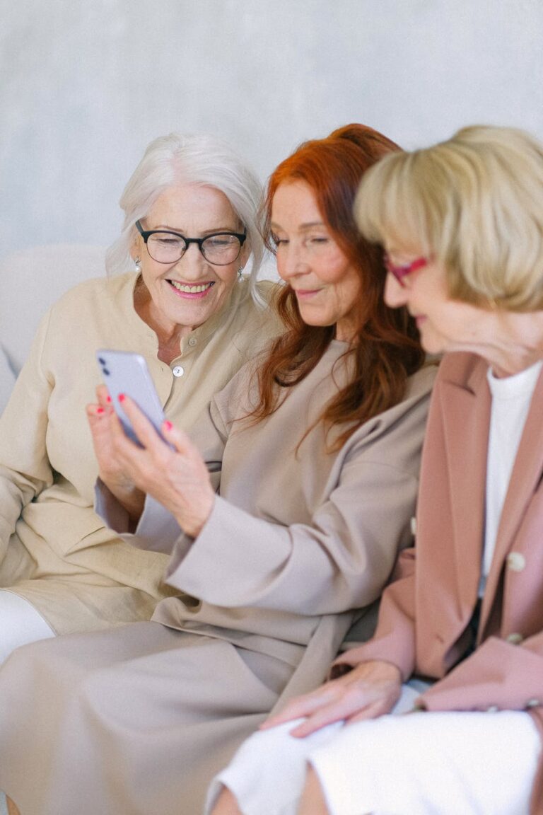 Mature women looking at a phone