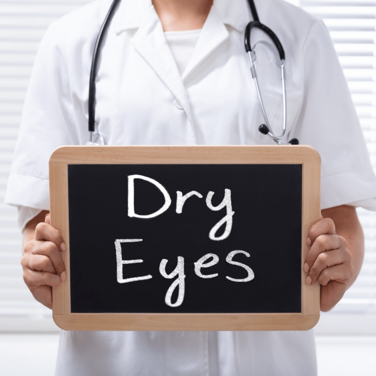 Doctor holding a dry eyes sign